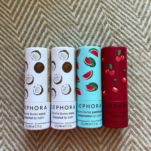 Four Sephora unopened sealed lip balms